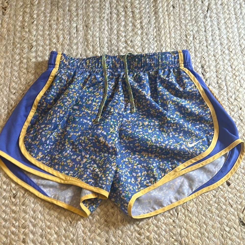 Nike Athletic women’s shorts blue, yellow, green, and orange speckled